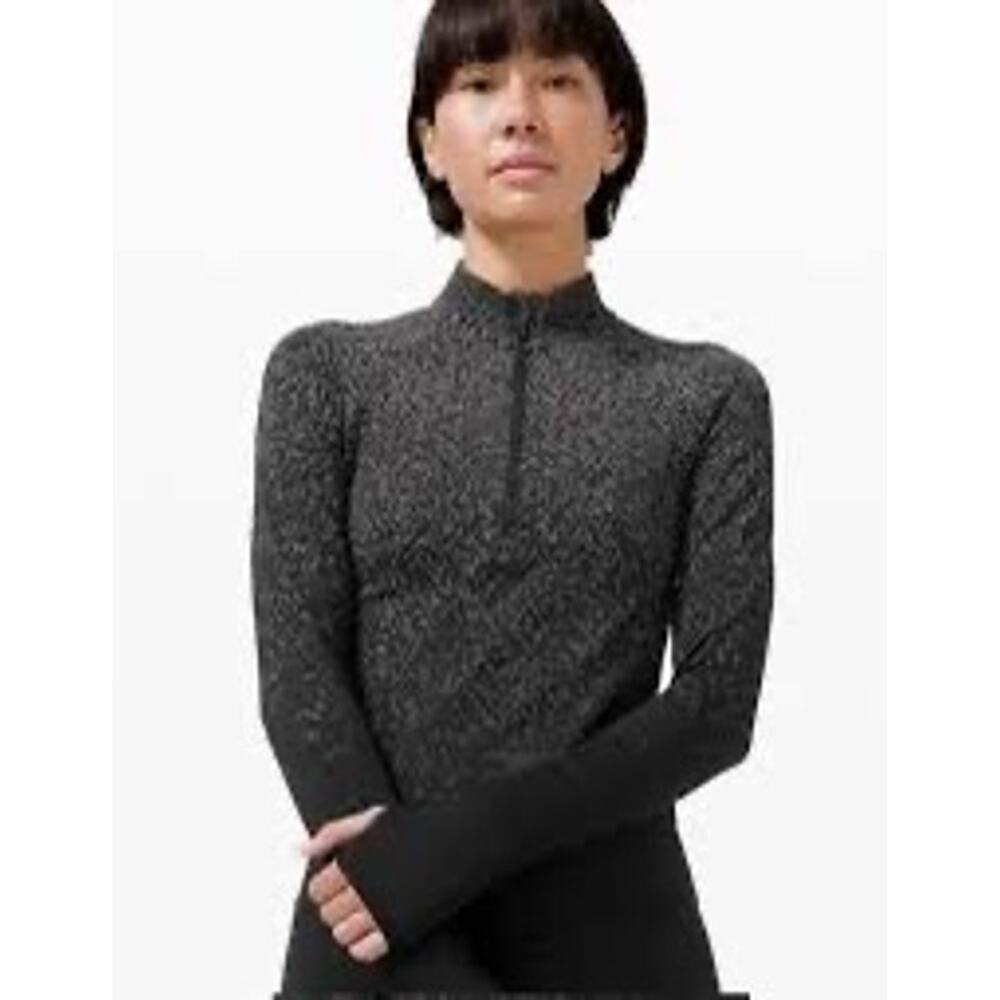 Lululemon Rest Less Cropped in the Herringbone Fade Black/White color - Size 10